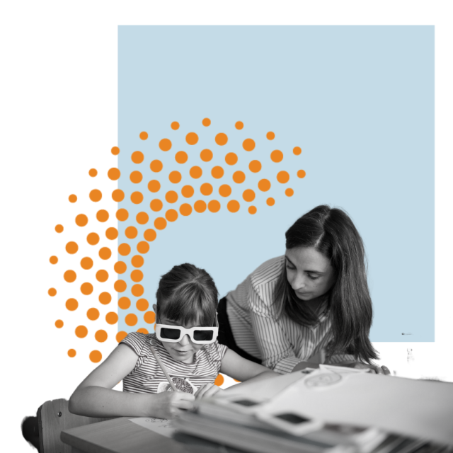 Teacher and student working on an activity together