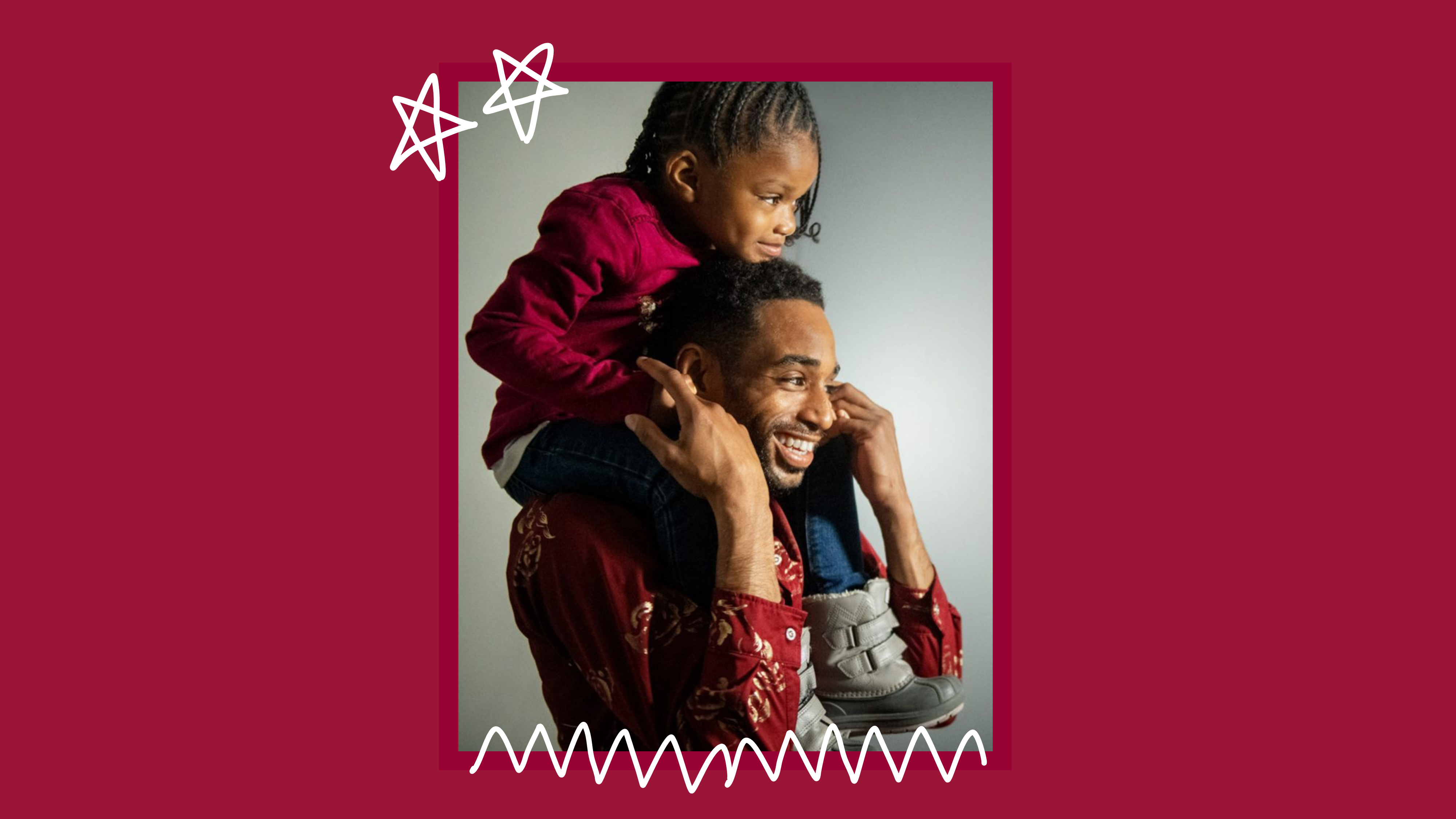 A father is keeping his child on his shoulders. 